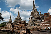 Ayutthaya, Thailand. Wat Phra Si Sanphet, the three chedi the only survivors of the Burmese sack of 1767. The low ruins in the foreground are what remains of the surrounding gallery. 